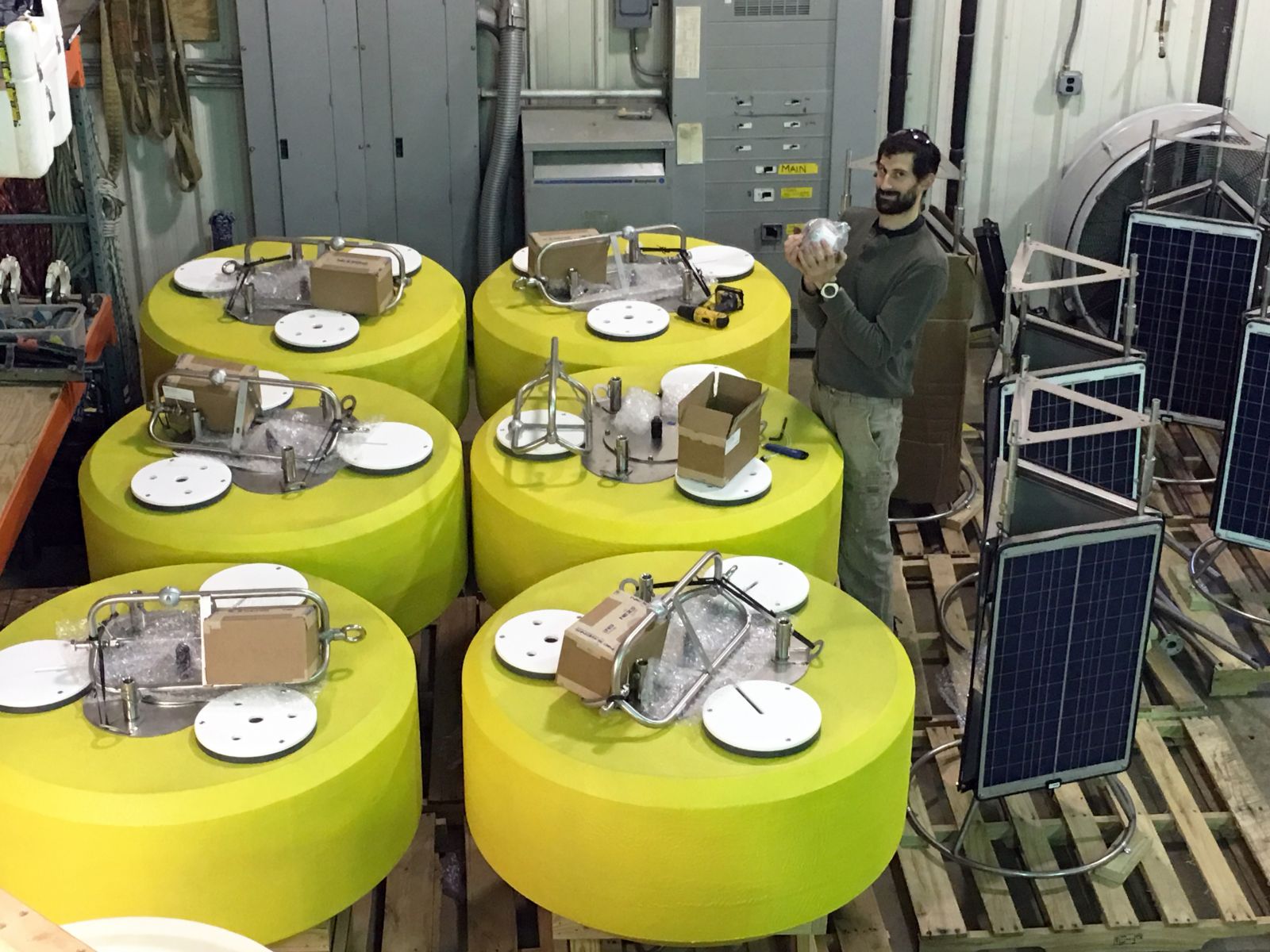 A CBIBS technician organizes new buoy parts