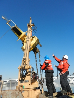 USCG Milford Haven hoists the UP buoy in December 2011